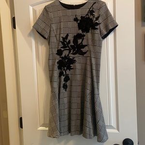 Short black and white patterned dress with black floral, Betsy Johnson